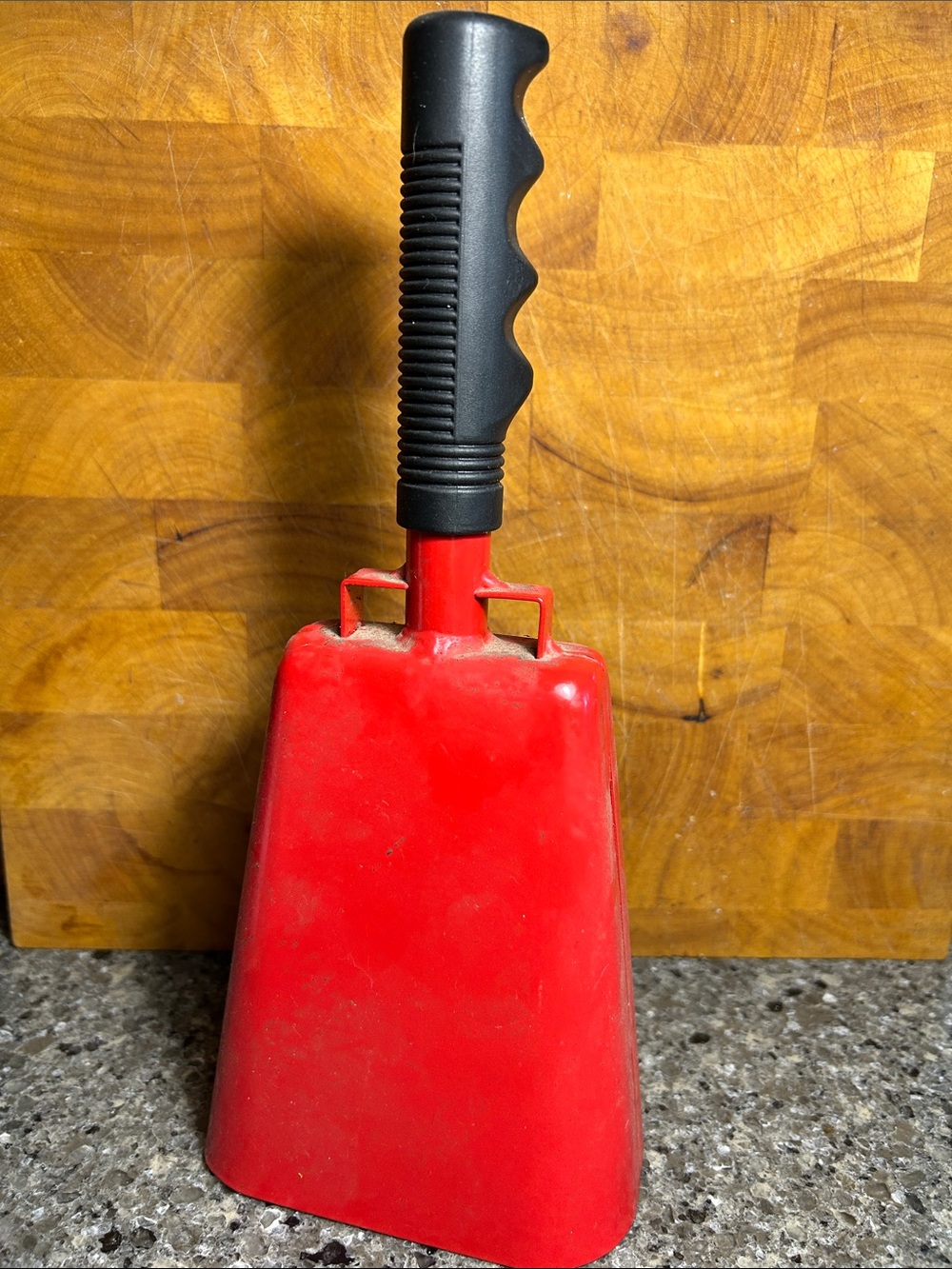 Handheld metal cowbell